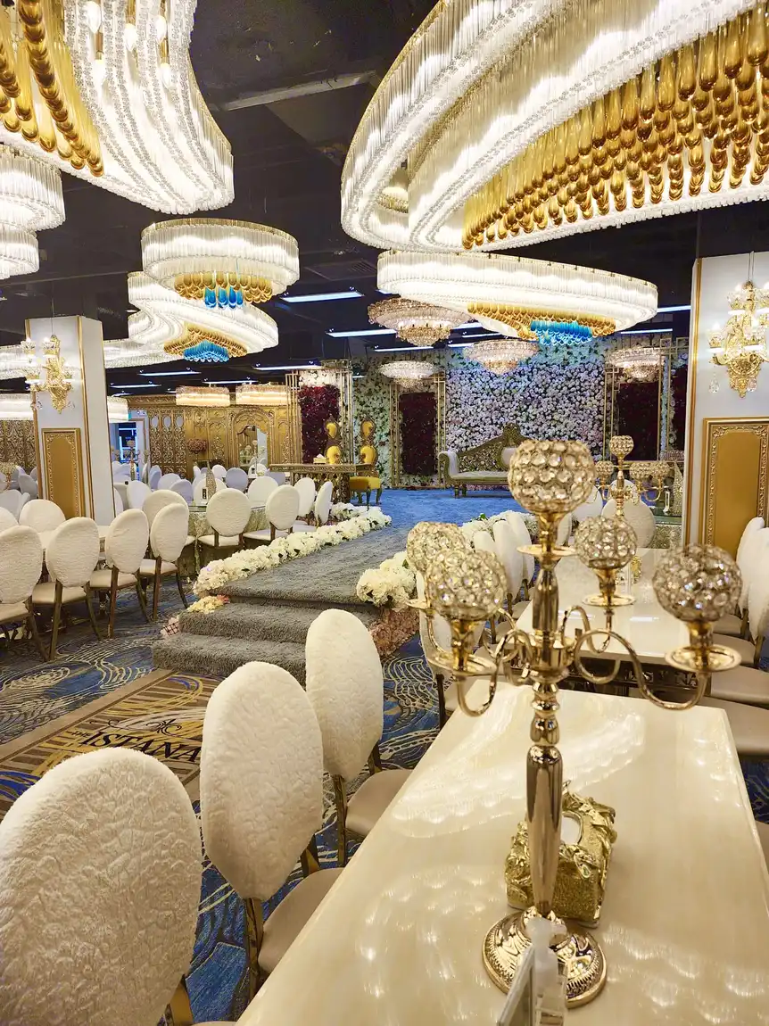 Gold candelabra centrepiece on a laid banquet table
