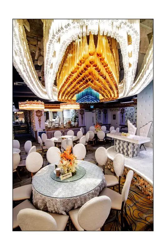 Bridal dais under crystal chandeliers